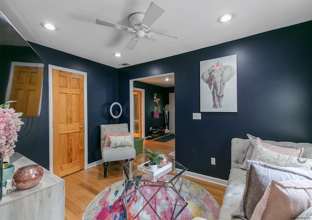 bedroom featuring ceiling fan and hardwood / wood-style flooring