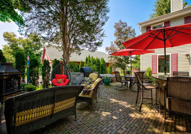 view of patio featuring an outdoor living space and an outdoor bar