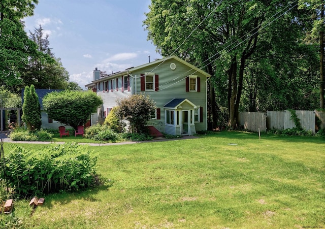 exterior space with a lawn