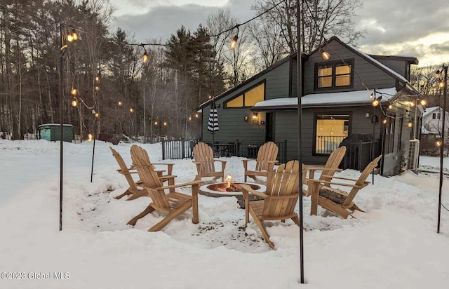 exterior space with a fire pit