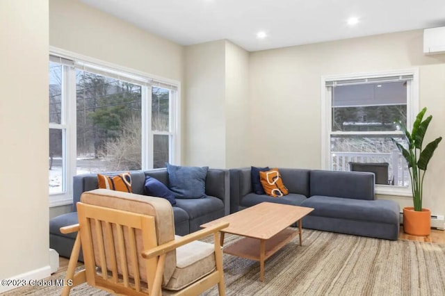 living room with a wall mounted AC and a baseboard heating unit