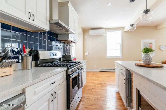 kitchen featuring white cabinetry, a baseboard radiator, tasteful backsplash, decorative light fixtures, and stainless steel range with gas stovetop