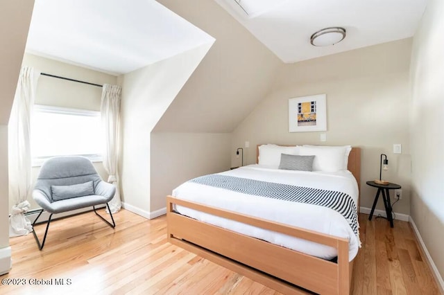 bedroom with light wood-type flooring