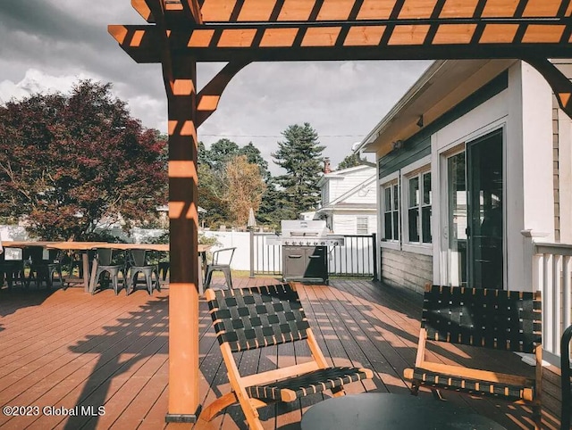 wooden terrace with area for grilling