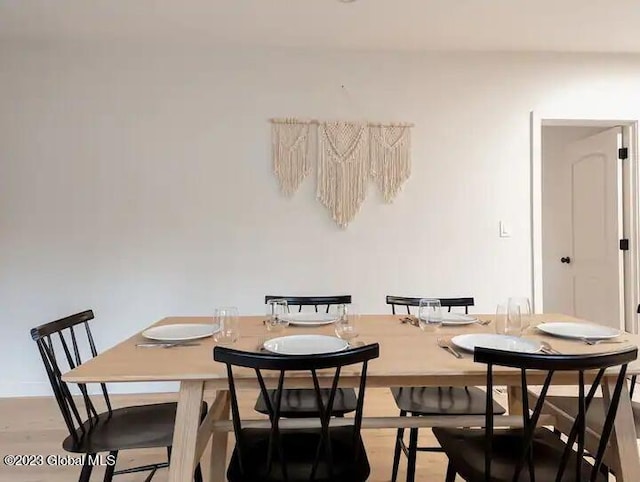 dining room with light hardwood / wood-style flooring