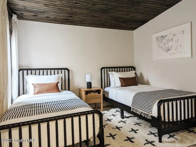 bedroom with wooden ceiling