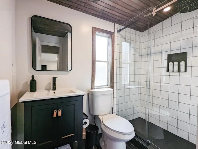 bathroom featuring vanity, wooden ceiling, toilet, and a shower with shower door