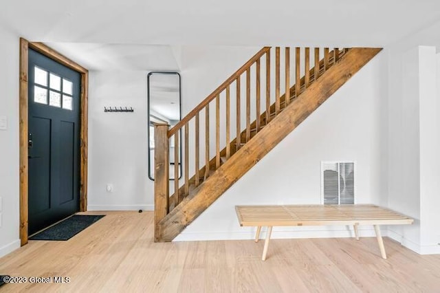 entrance foyer featuring hardwood / wood-style floors