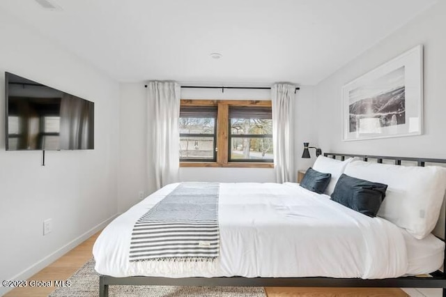 bedroom featuring light hardwood / wood-style floors