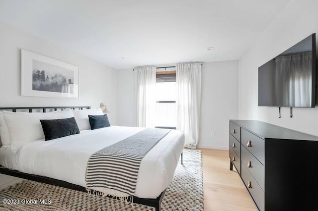 bedroom featuring light hardwood / wood-style floors