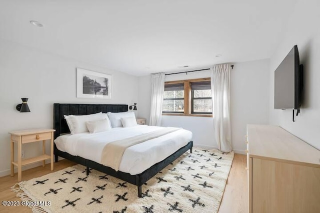 bedroom featuring light wood-type flooring