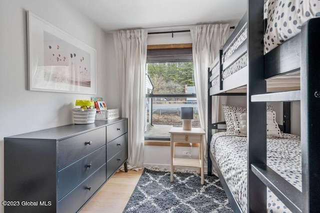 bedroom with light hardwood / wood-style flooring