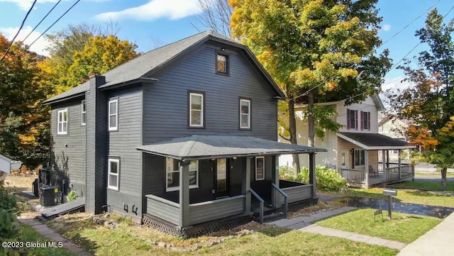 exterior space featuring a porch and central air condition unit