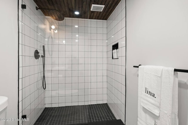 7913 Main St, Hunter, NY 12442 - bathroom with toilet, wooden ceiling, and tiled shower