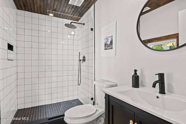 7913 Main St, Hunter, NY 12442 - bathroom with tiled shower, vanity, and toilet