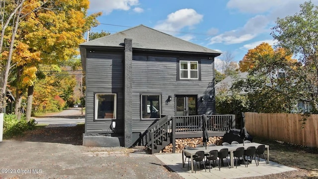 7913 Main St, Hunter, NY 12442 - rear view of property with a patio area and a wooden deck