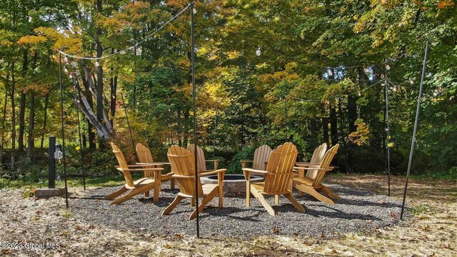 7913 Main St, Hunter, NY 12442 - view of playground featuring an outdoor fire pit