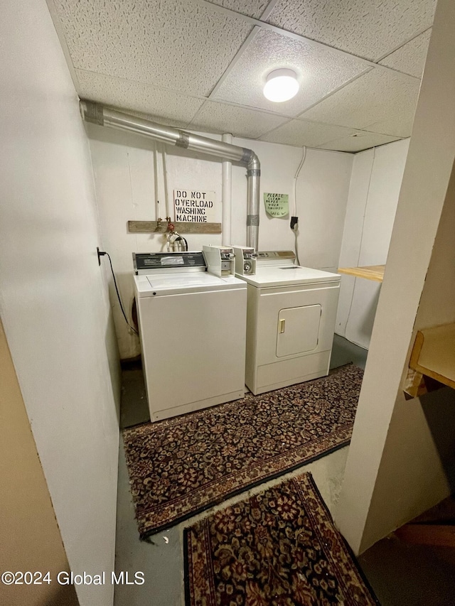 laundry room featuring separate washer and dryer