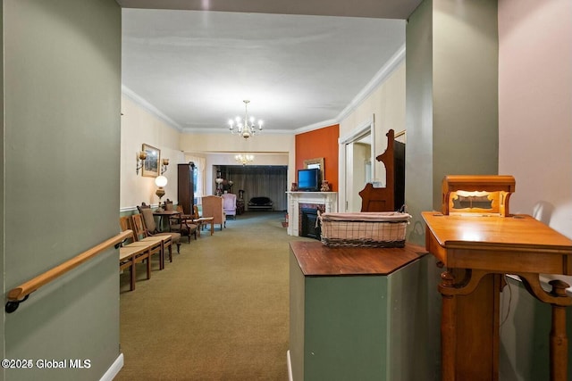 kitchen featuring carpet flooring, a notable chandelier, pendant lighting, and crown molding