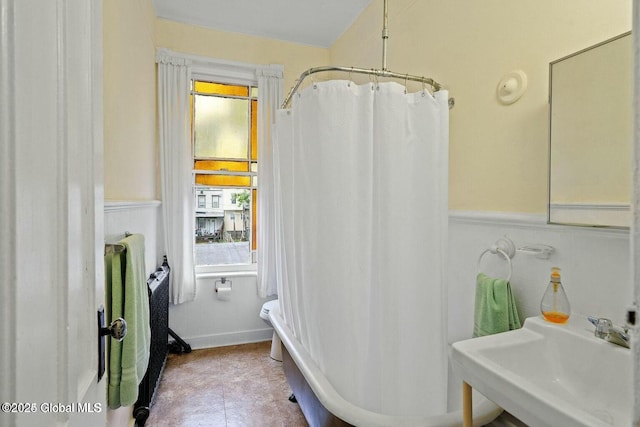 bathroom with sink and walk in shower