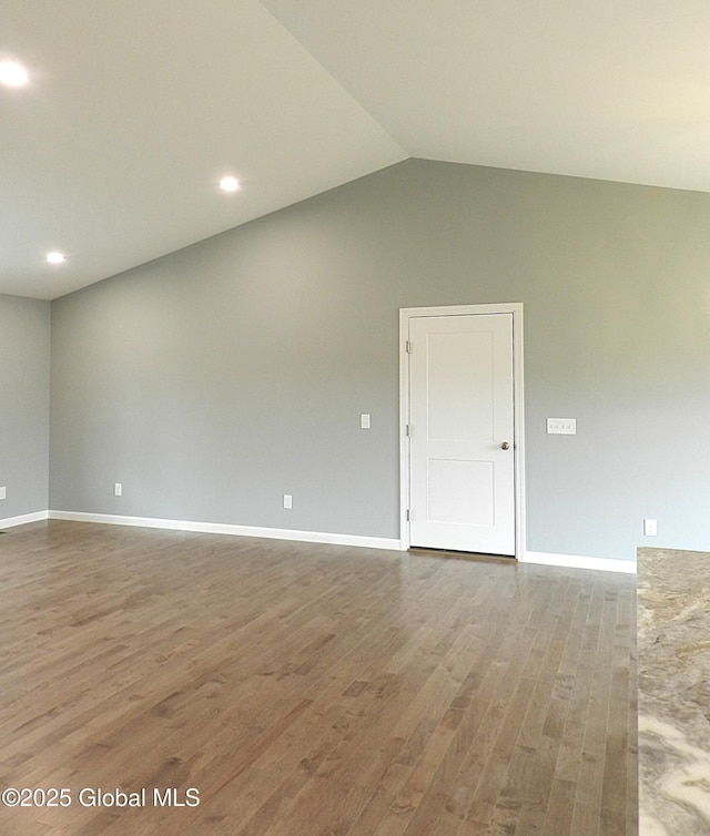 71 Bluebird Rd, Moreau, NY 12803 - empty room featuring wood finished floors, vaulted ceiling, and recessed lighting