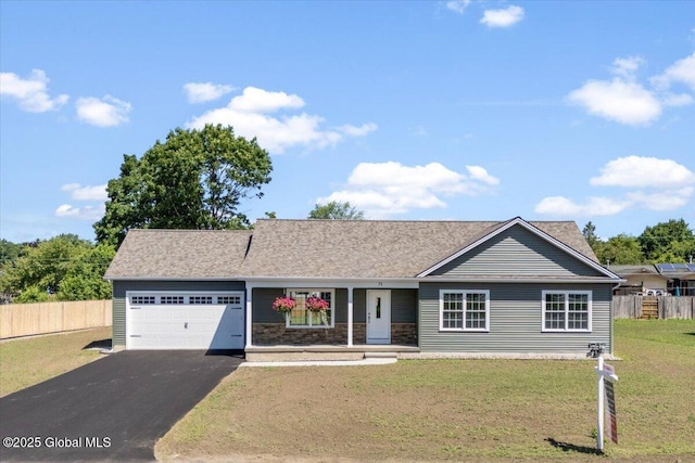71 Bluebird Rd, Moreau, NY 12803 - ranch-style house with a garage, driveway, and covered porch