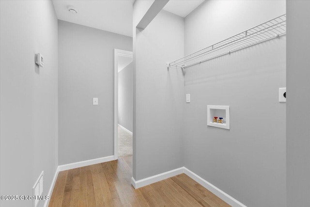 71 Bluebird Rd, Moreau, NY 12803 - laundry room with hookup for a washing machine, light wood finished floors, and electric dryer hookup