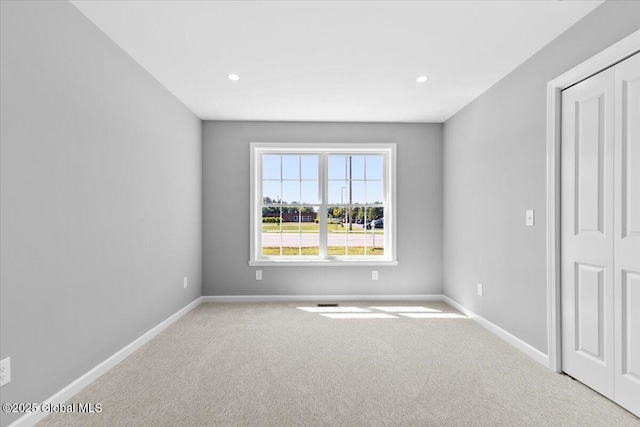 71 Bluebird Rd, Moreau, NY 12803 - unfurnished bedroom featuring carpet, recessed lighting, and a closet