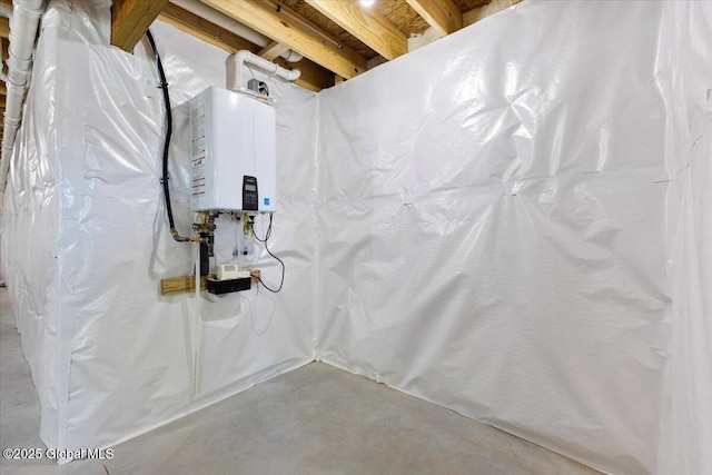 71 Bluebird Rd, Moreau, NY 12803 - unfinished basement featuring tankless water heater
