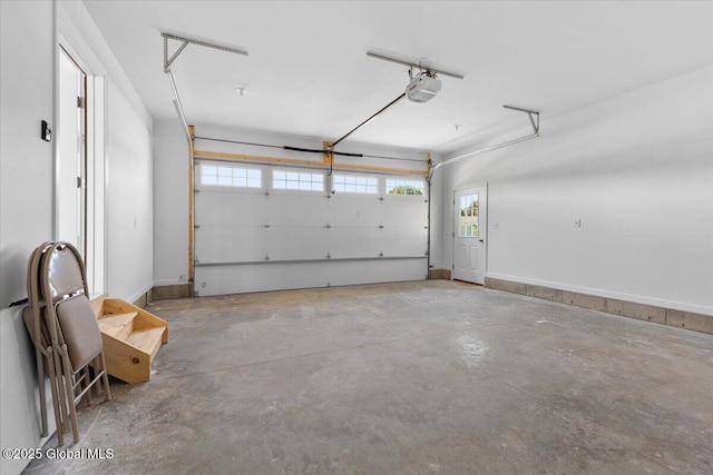71 Bluebird Rd, Moreau, NY 12803 - garage featuring a garage door opener