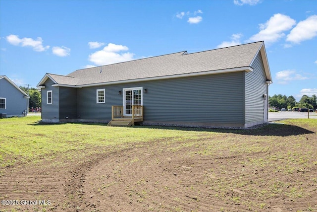 71 Bluebird Rd, Moreau, NY 12803 - back of house featuring a yard
