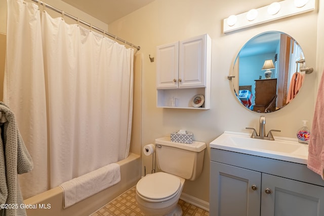 full bathroom featuring toilet, vanity, and shower / bathtub combination with curtain