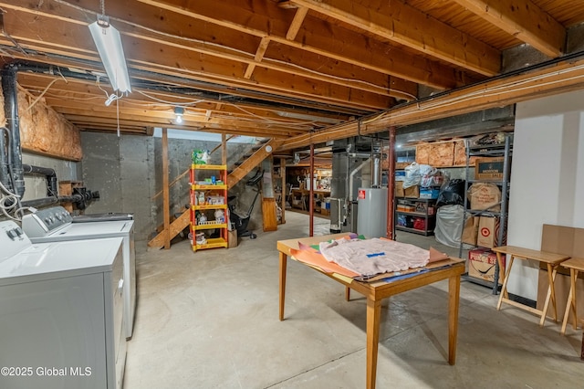 basement with separate washer and dryer, heating unit, and gas water heater