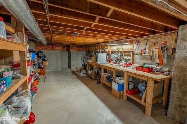 basement with a workshop area