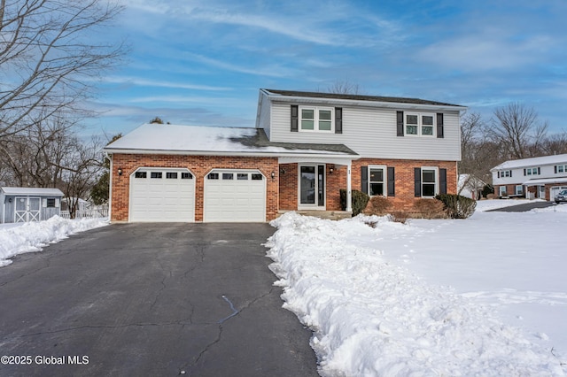 front of property with a garage