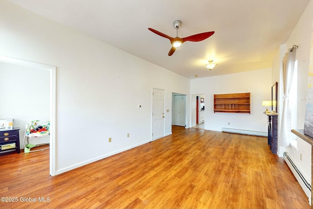 living room featuring light hardwood / wood-style flooring, a baseboard radiator, and ceiling fan