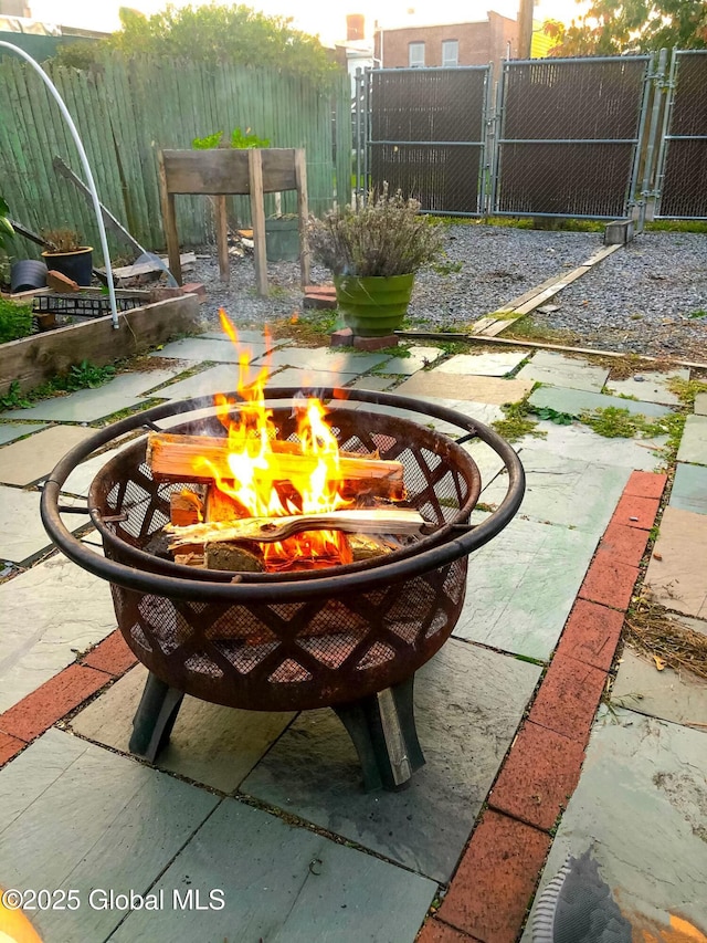 view of patio / terrace with a fire pit