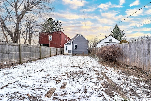 view of yard covered in snow