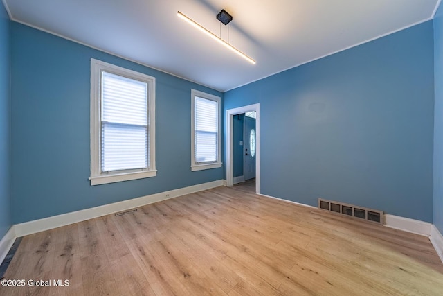 empty room featuring light wood-type flooring