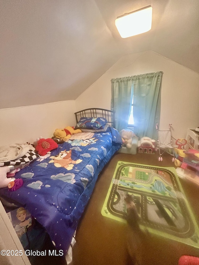 bedroom featuring vaulted ceiling