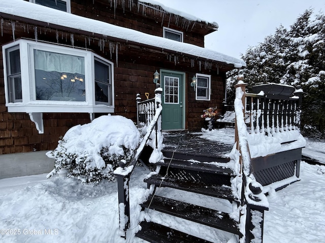 view of snow covered deck