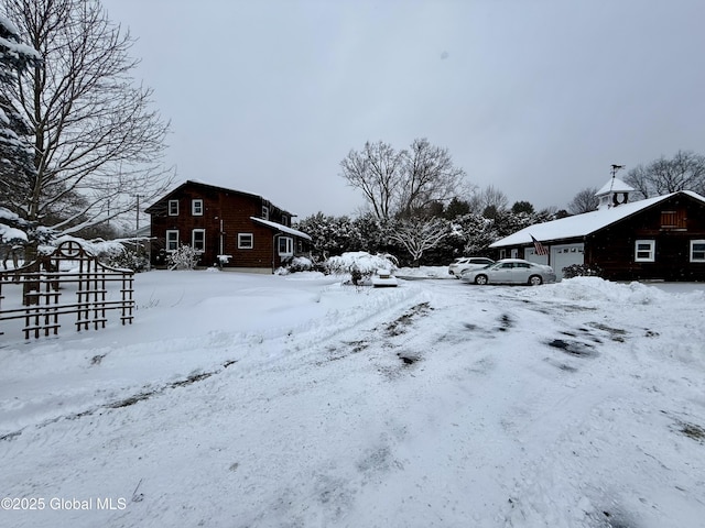 view of yard layered in snow