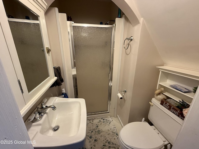 bathroom with tile patterned flooring, toilet, a shower with shower door, and sink