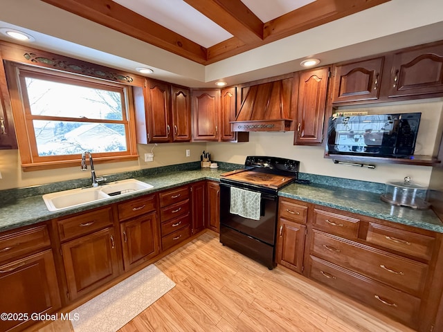 kitchen with light wood-type flooring, premium range hood, sink, beam ceiling, and electric range