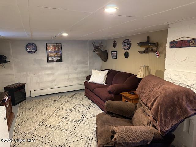 living room featuring a baseboard heating unit