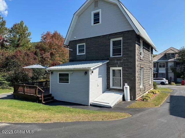 rear view of house with a deck