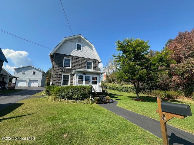 exterior space with a front lawn