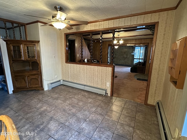 interior space featuring a baseboard heating unit, crown molding, and ceiling fan