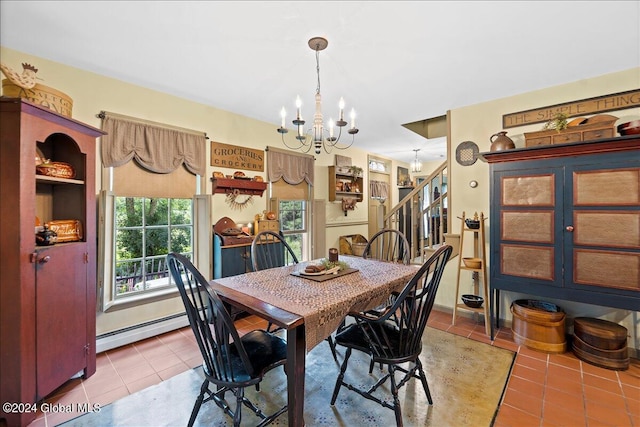 tiled dining area featuring a baseboard radiator and an inviting chandelier