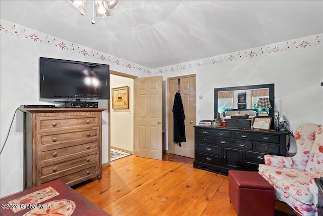 living area featuring hardwood / wood-style floors